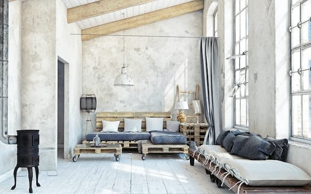 large room with furniture made from used pallets